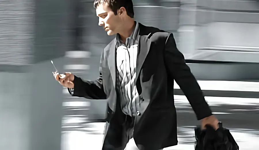 Man scanning his cell phone for security status